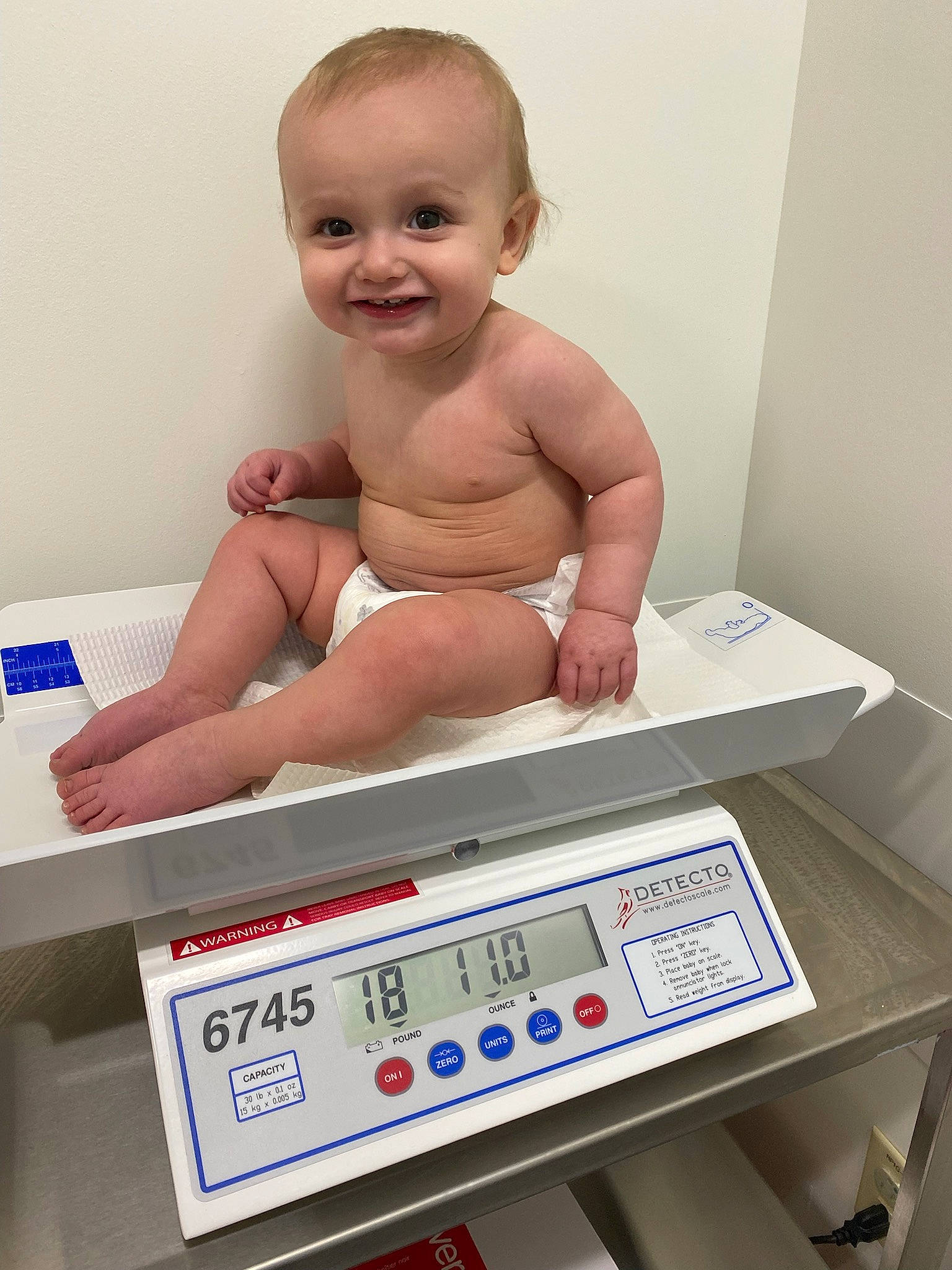Owen joined the competition — help win amazing prizes! abdomen, baby, bathing, box, carton, chest, child, diaper, finger, human_leg, joy, machine, medical_equipment, office_equipment, office_supplies, person, service, sitting, smile, stomach