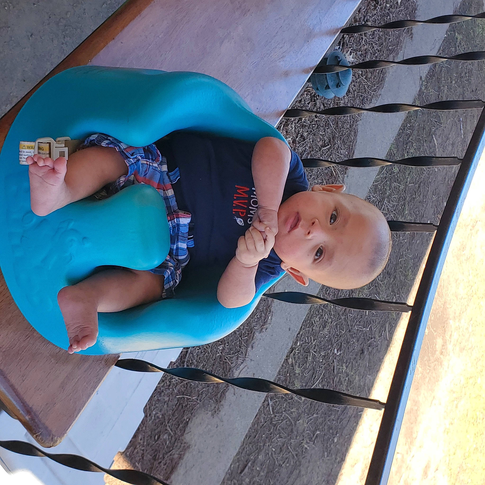 Ace is registered to the contest to win money with this photo: azure, baby, baby_products, baby_toddler_clothing, blue, child, elbow, electric_blue, fun, hat, human_body, human_leg, leisure, pattern, person, product, sitting, thigh, toddler, water