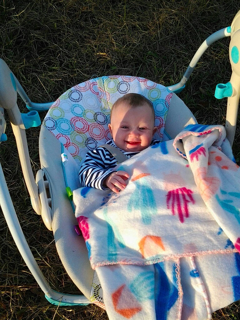 Ainzley joined the competition — help win amazing prizes! baby_products, blue, child, cool, fun, infant, leisure, person, play, product, recreation, sitting, textile, toddler, vacation