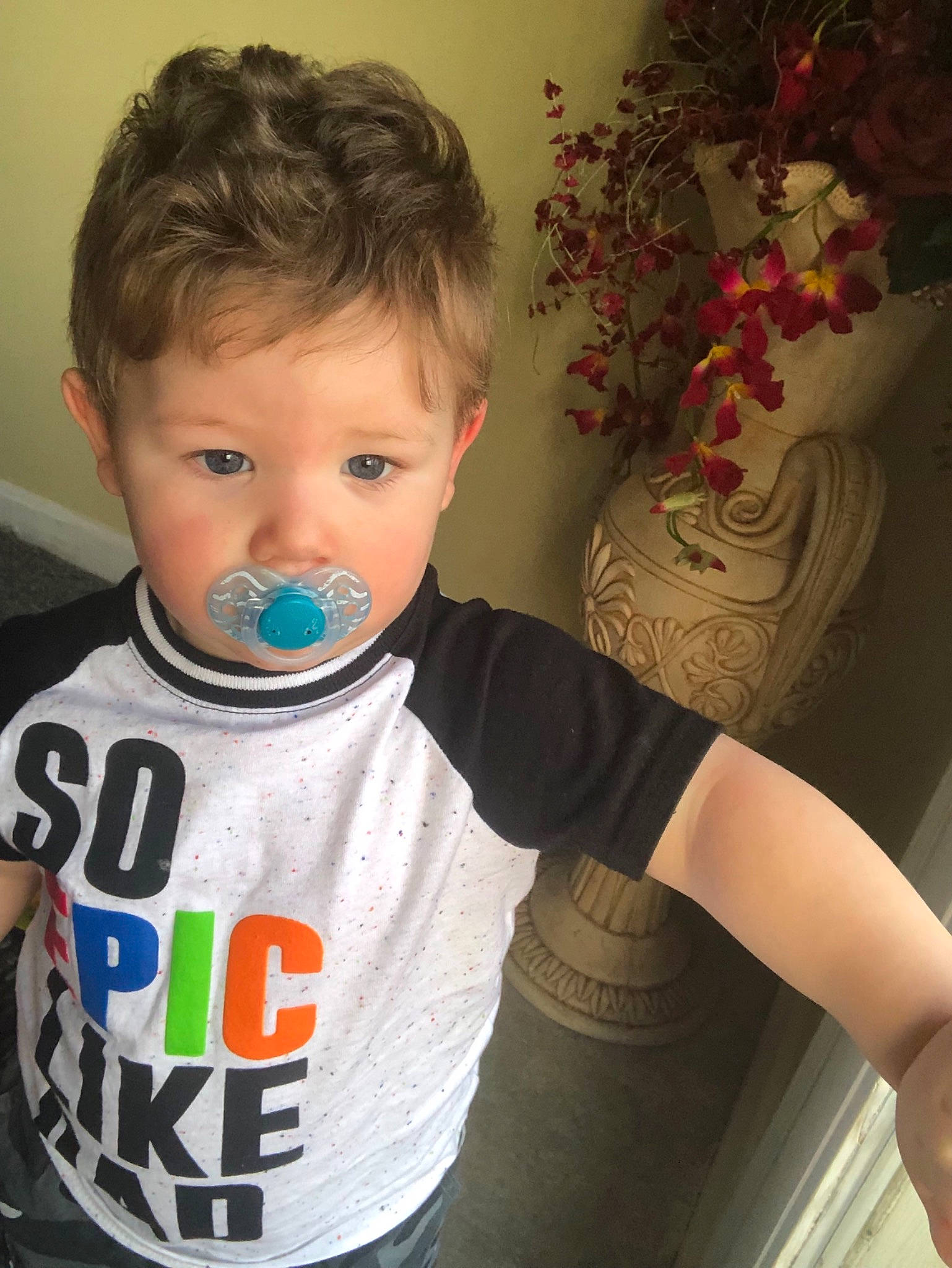 Gabriel is registered to the contest to win money with this photo: baby, cheek, child, face, neck, nose, person, t_shirt, toddler