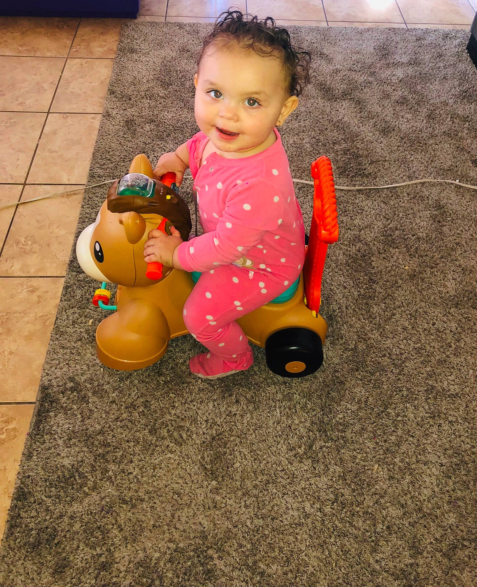 Emberlyn joined the competition — help win amazing prizes! asphalt, baby, baby_products, baby_toddler_clothing, baby_toys, face, floor, flooring, fun, grass, happy, head, joy, leisure, person, sitting, skin, smile, toddler, toy