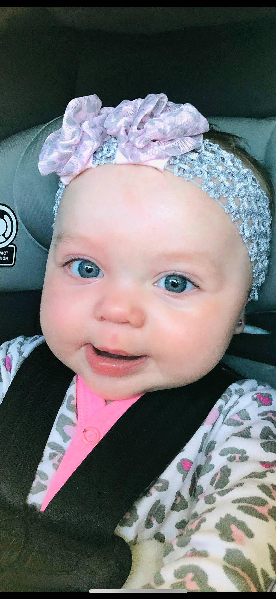 Emberlyn is registered to the contest to win money with this photo: baby, baby_toddler_clothing, cap, cheek, chin, clothing, eye, eyebrow, eyelash, hairstyle, head, headwear, iris, lip, nose, organ, person, pink, skin, smile