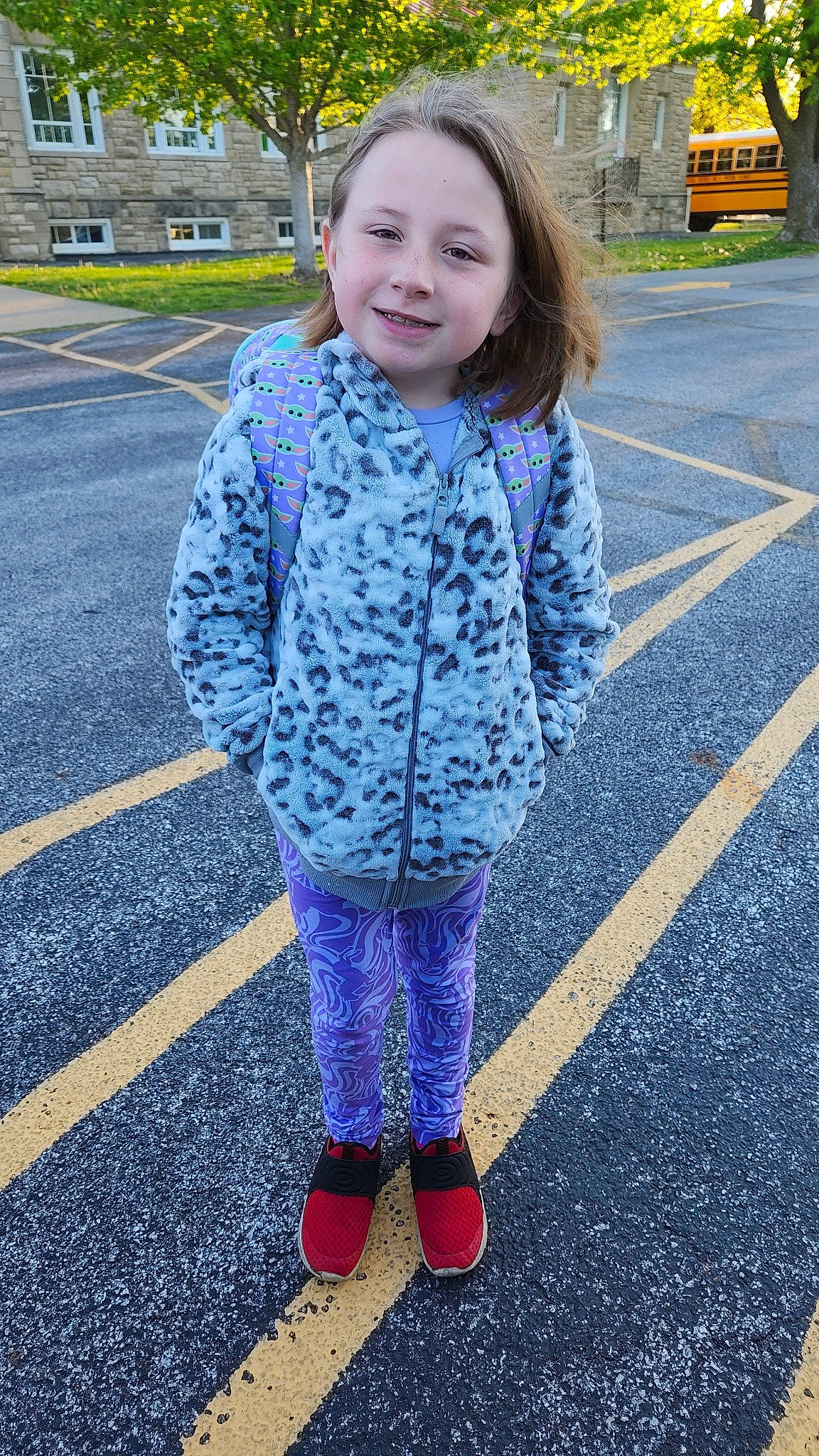 Logan is registered to the contest to win money with this photo: asphalt, denim, electric_blue, fun, grass, joy, magenta, pattern, pedestrian, person, photograph, pink, purple, recreation, road, road_surface, sidewalk, sleeve, smile, snapshot
