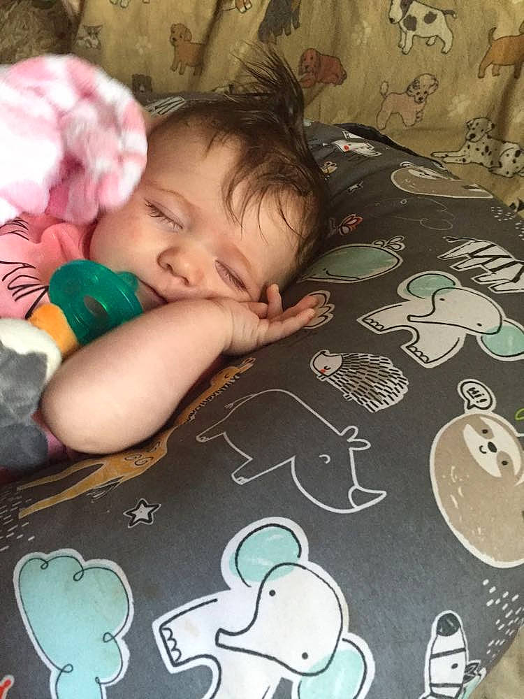 Madilyn is registered to the contest to win money with this photo: baby, baby_toddler_clothing, brown, cheek, child, comfort, flooring, fun, grass, green, happy, head, linens, mammal, pattern, person, room, snapshot, textile, toddler