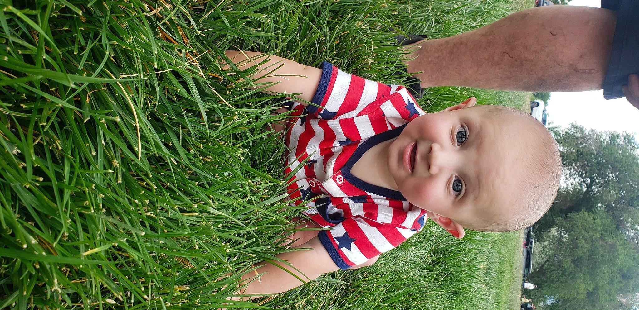 Atlus joined the competition — help win amazing prizes! baby, baby_toddler_clothing, child, fun, grass, grass_family, grassland, happy, lawn, leaf, leisure, meadow, pattern, people_in_nature, person, plant, sitting, toddler, tree, vertebrate