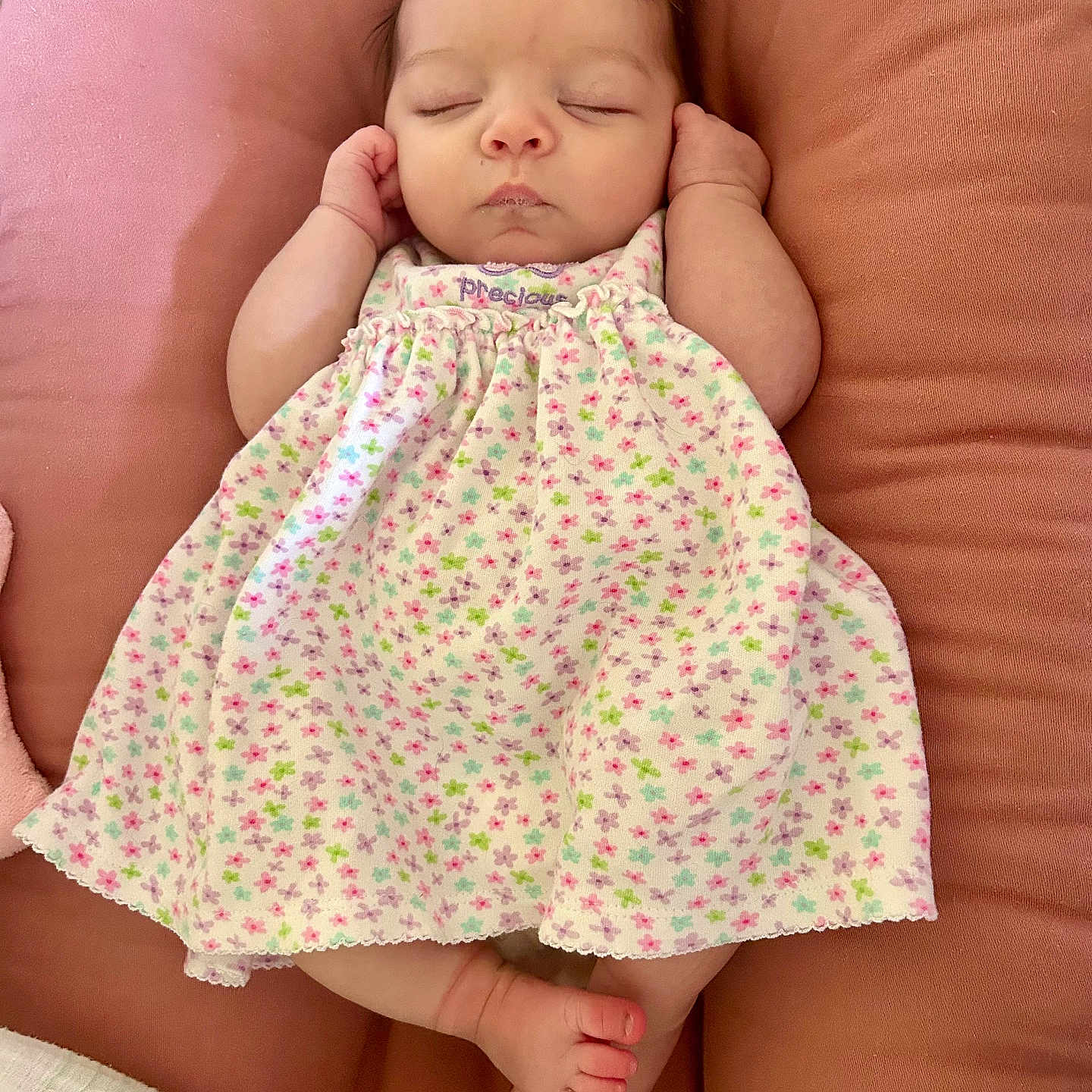 Gracie is registered to the contest to win money with this photo: adorable, baby, child, closeup, cozy, cushion, cute, dress, feet, floral_pattern, hands, indoors, infant, newborn, peaceful, pink, portrait, resting, sleeping, soft