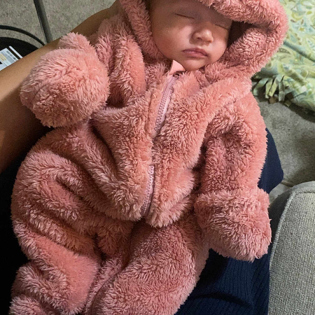Azalea joined the competition — help win amazing prizes! baby, bear_ears, blanket, carpet, child, cozy, cute, fabric, fuzzy, hand, hood, indoor, infant, nap, onesie, person, pink, rest, sleeping, soft