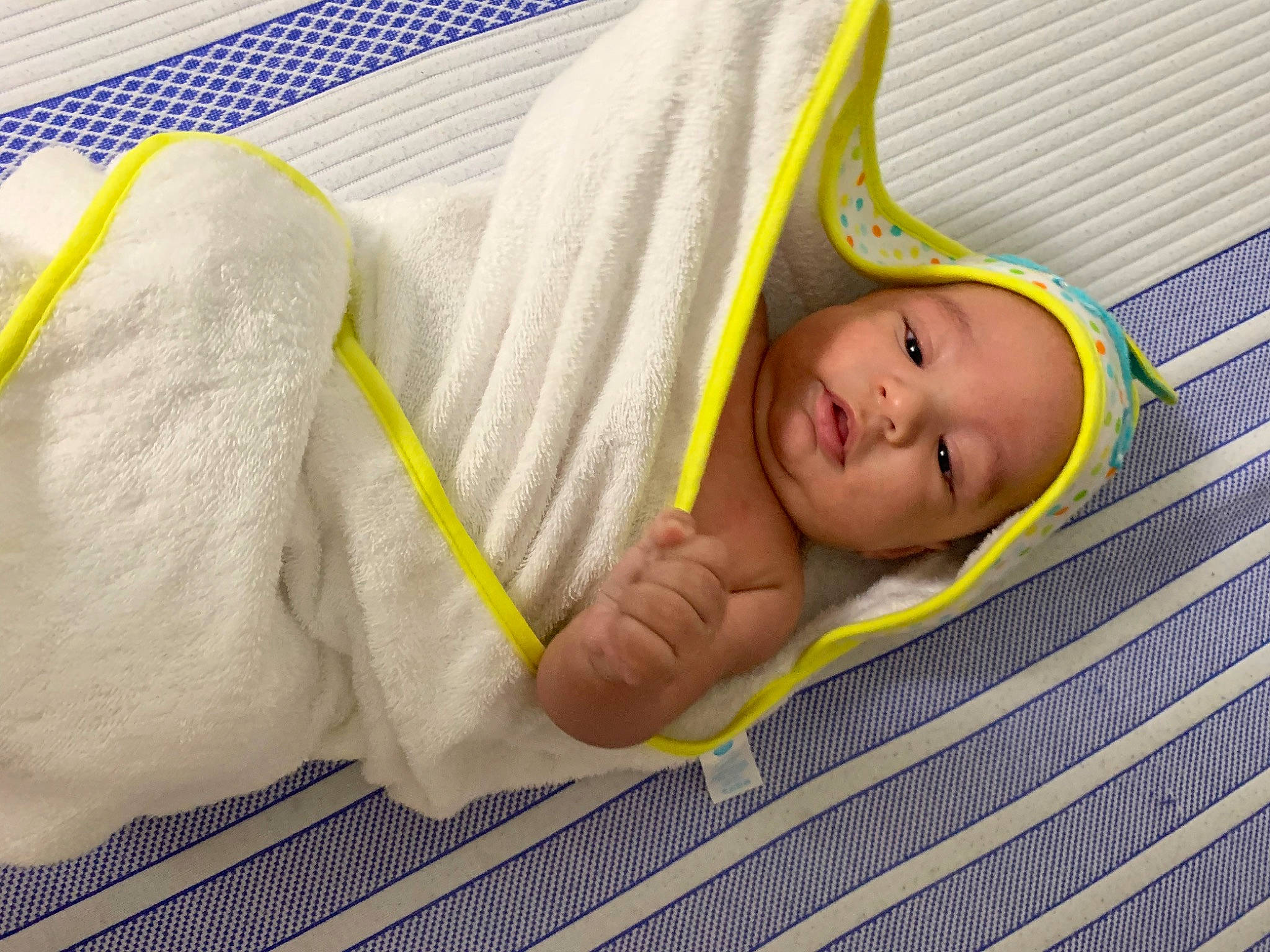 Esteban joined the competition — help win amazing prizes! baby, baby_safety, baby_sleeping, bedtime, blanket, child, infant_bed, linens, nap, person, product, sleep, toddler, yellow