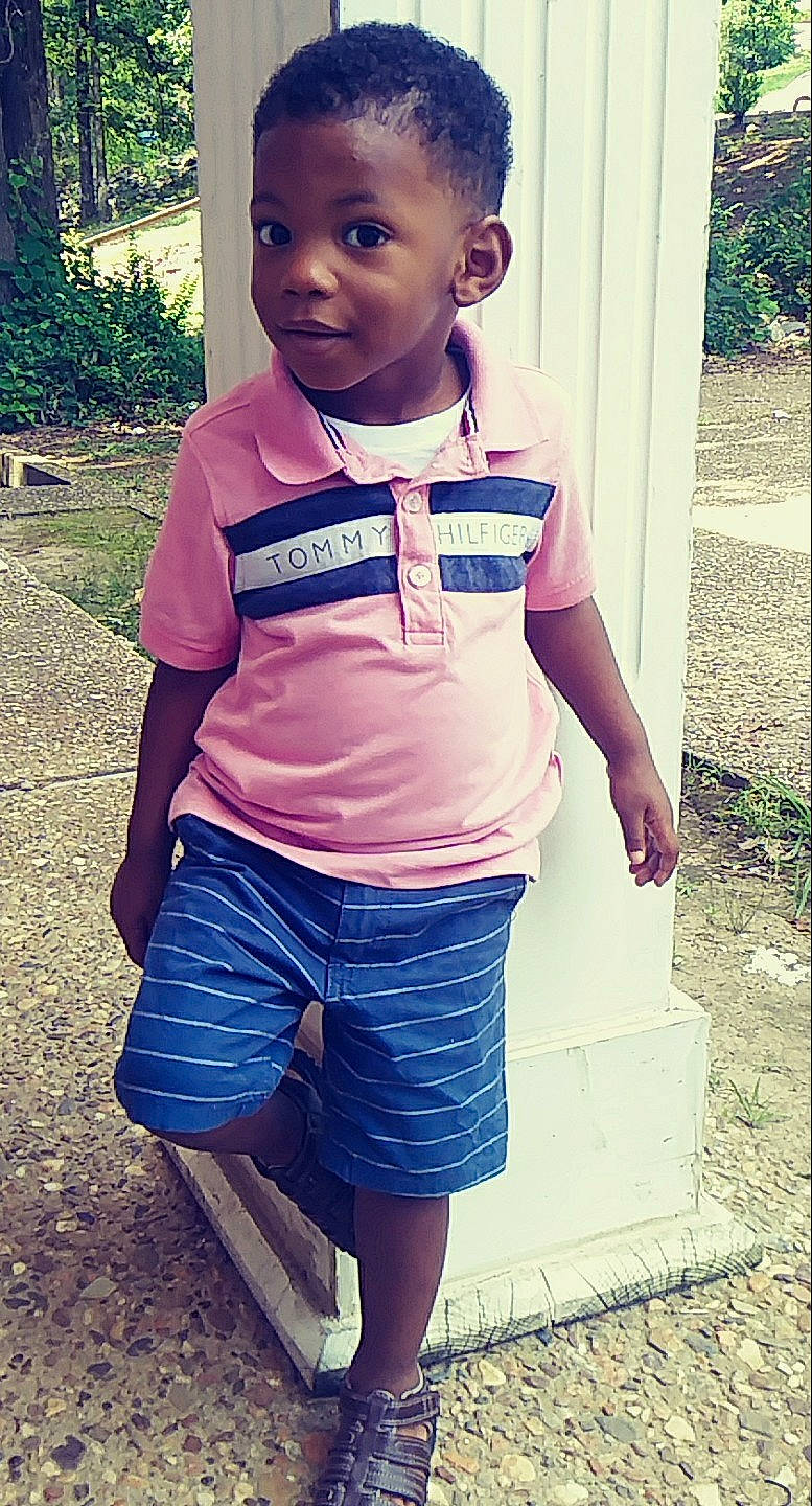 Breon is registered to the contest to win money with this photo: child, child_model, cool, denim, face, happy, head, jeans, male, person, shoe, shorts, smile, standing, summer, t_shirt, toddler