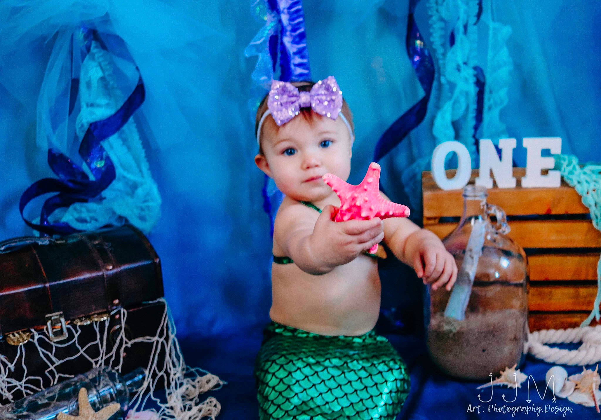 Kayce is registered to the contest to win money with this photo: abdomen, aqua, baby, baby_products, baby_toddler_clothing, basket, blue, hair_accessory, headpiece, headwear, navel, person, stomach, storage_basket, teal, trunk, turquoise