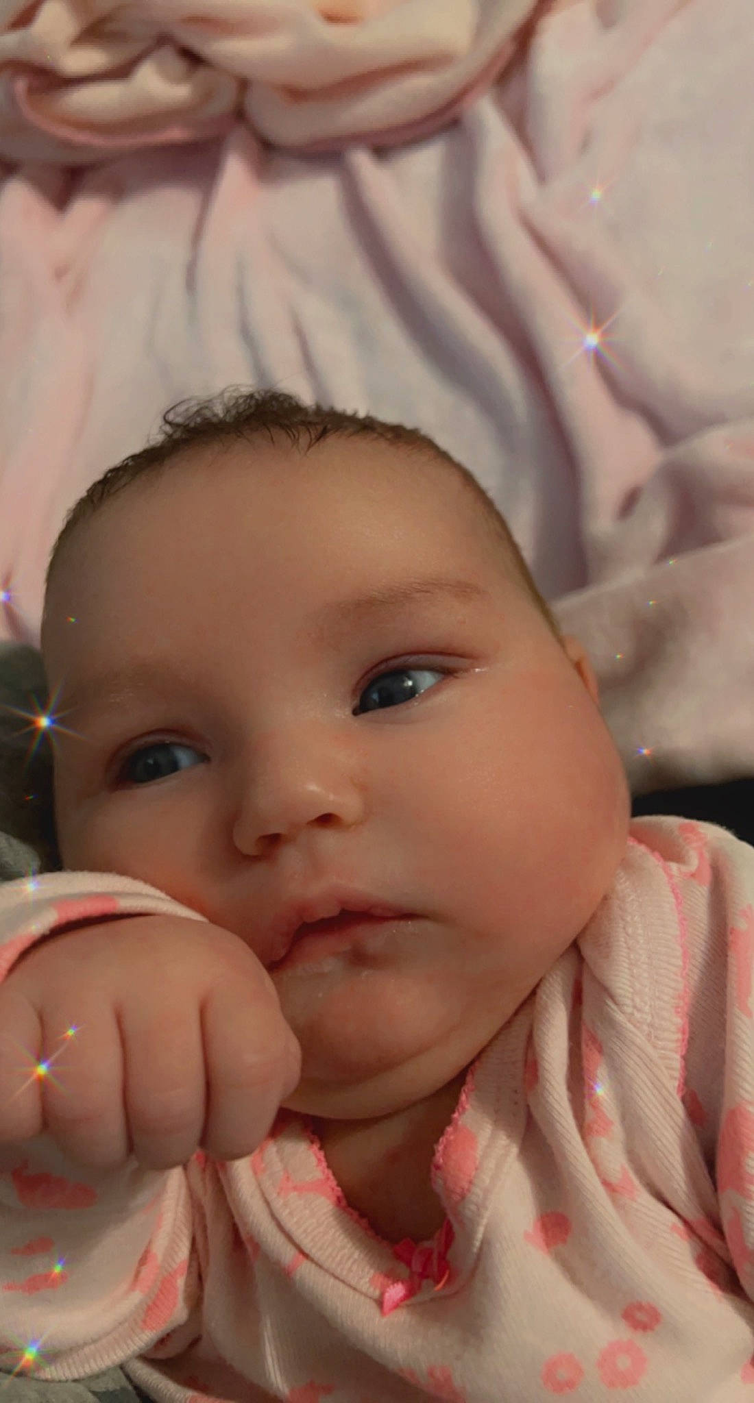 Lyric is registered to the contest to win money with this photo: baby, cheek, chin, ear, eye, eyebrow, eyelash, finger, forehead, gesture, happy, head, human_body, iris, lip, mouth, nose, person, pink, skin