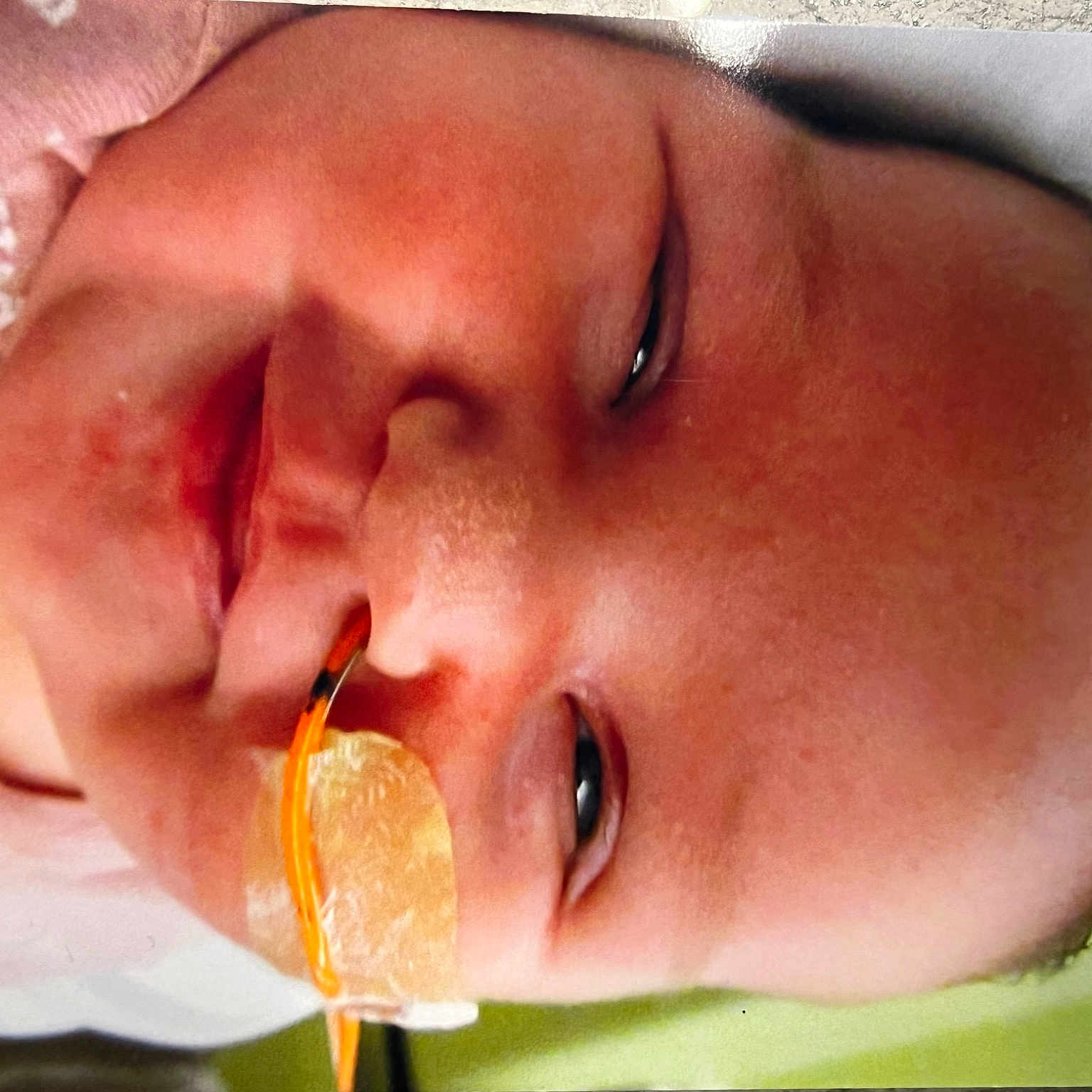 Lyric is registered to the contest to win money with this photo: baby, beauty, cheek, chin, ear, eyebrow, eyelash, face, finger, food, happy, jaw, lip, mouth, nail, neck, nose, orange, organ, skin