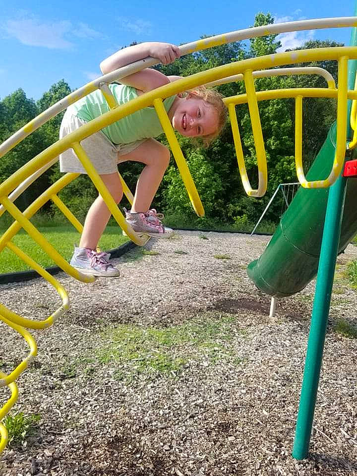 Nevaeh joined the competition — help win amazing prizes! chute, city, cloud, fun, grass, joy, leisure, nonbuilding_structure, outdoor_play_equipment, outdoor_recreation, person, plant, play, playground, playground_slide, pole, recreation, shorts, sky, smile