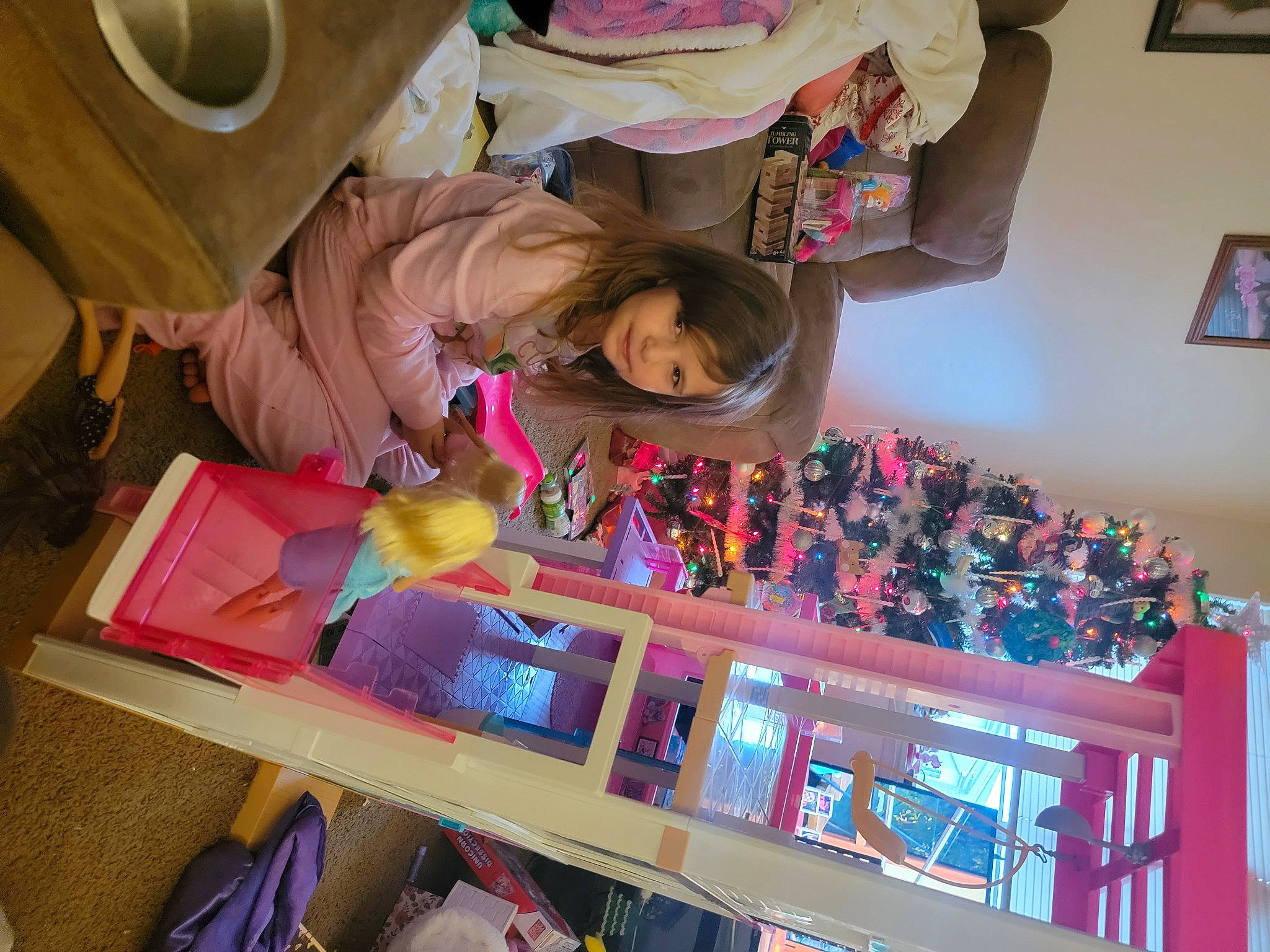 Emmalynn is registered to the contest to win money with this photo: child, event, fedora, fun, leisure, magenta, party, person, picture_frame, pink, play, room, shelf, shelving, stuffed_toy, sun_hat, sunglasses, textile, toy, visual_arts