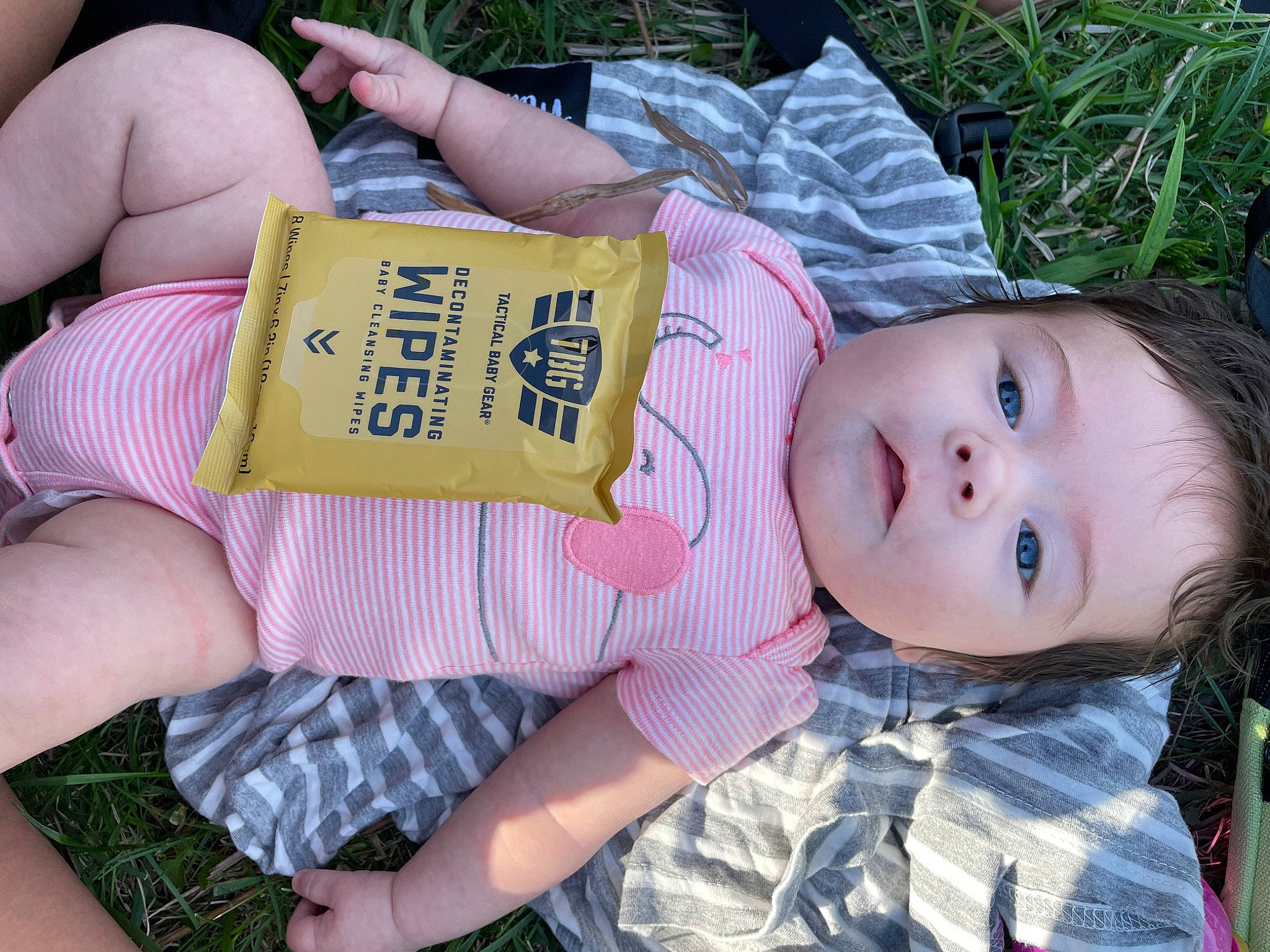 Rylie joined the competition — help win amazing prizes! baby, baby_toddler_clothing, beauty, cheek, child, facial_expression, grass, happy, nail, pattern, person, pink, plant, skin, smile, summer, thigh, thumb, toddler, tree