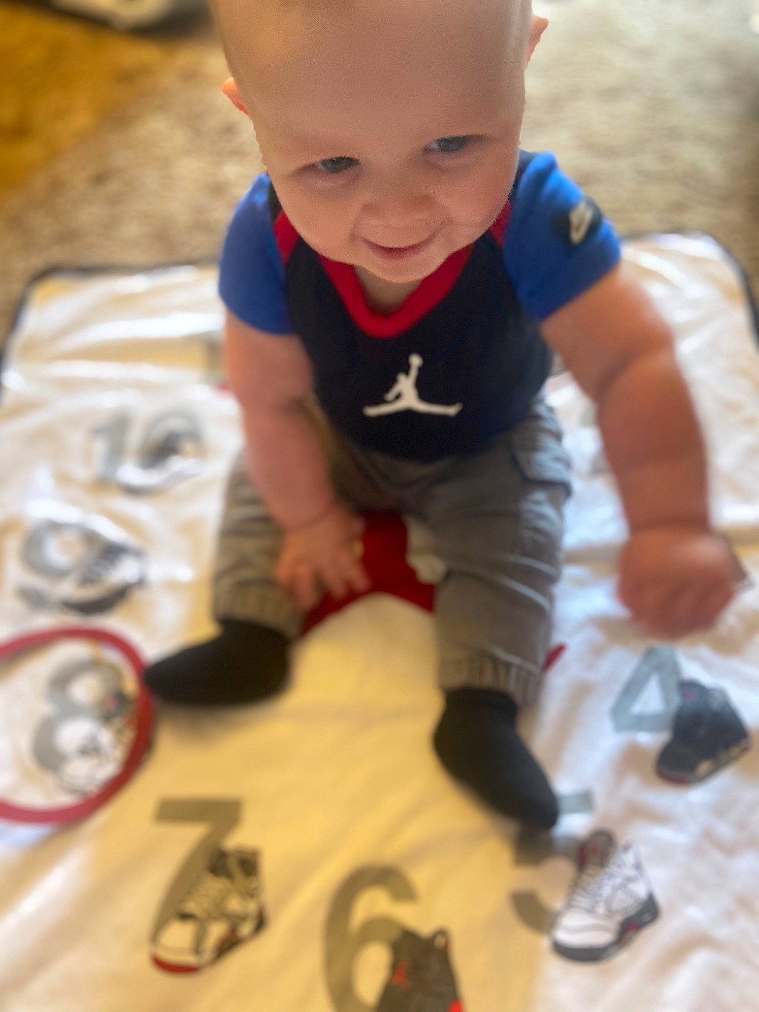 Jericho joined the competition — help win amazing prizes! arm, baby, baby_toddler_clothing, carmine, child, crawling, eye, finger, floor, flooring, fun, happy, head, person, play, shoe, sitting, smile, sneakers, toddler