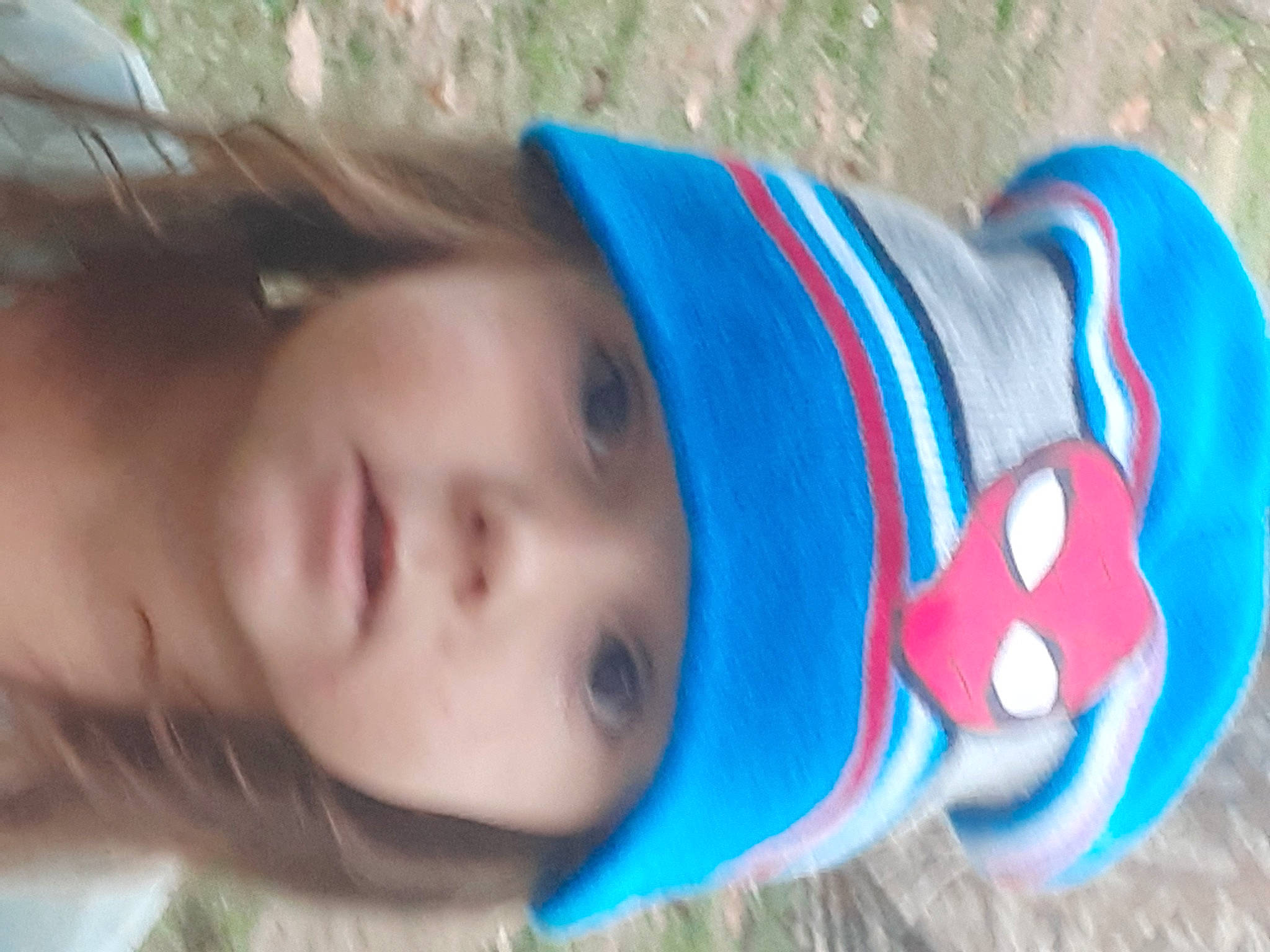 Hazel Grace is registered to the contest to win money with this photo: baby, baby_toddler_clothing, child, clothing, electric_blue, eyelash, facial_expression, fashion_accessory, fun, grass, happy, headwear, human_body, leisure, lip, neck, nose, person, skin, sock