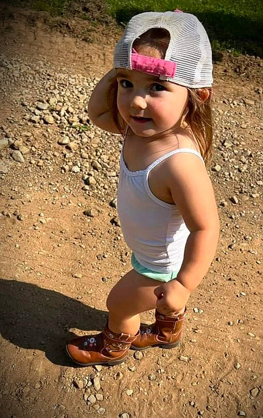 Hazel Grace joined the competition — help win amazing prizes! cap, child, eyewear, fashion_accessory, fun, grass, happy, hat, headwear, human_leg, landscape, leisure, magenta, people_in_nature, person, personal_protective_equipment, sand, sandal, soil, summer