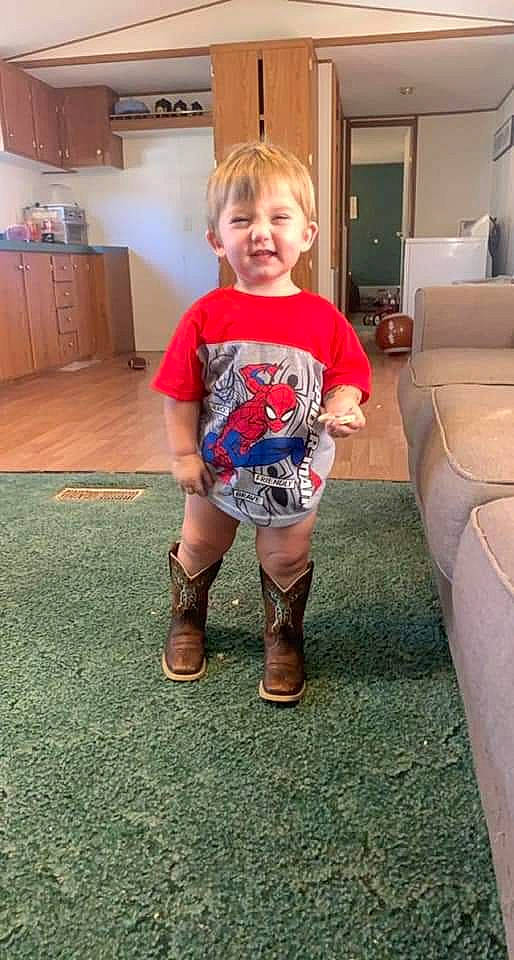 Ace joined the competition — help win amazing prizes! cabinetry, couch, electric_blue, face, floor, flooring, fun, hardwood, human_leg, joy, knee, leg, person, shoe, sleeve, smile, sock, standing, t_shirt, thigh