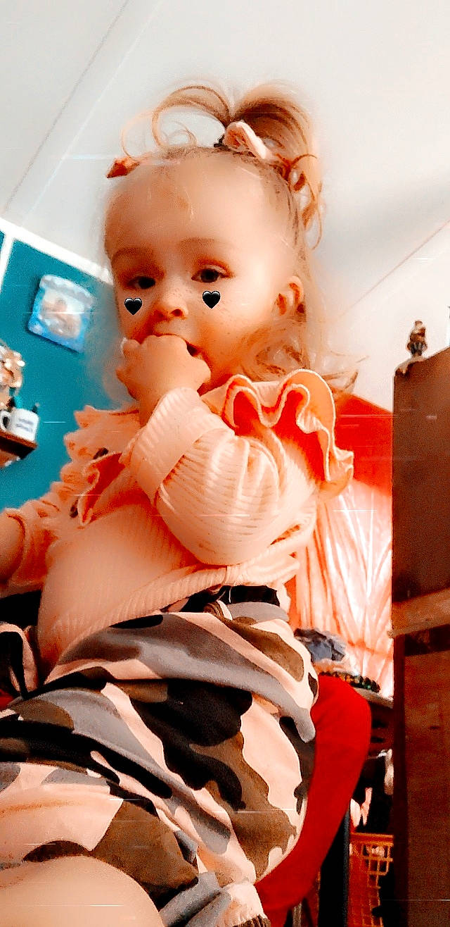 Zyah joined the competition — help win amazing prizes! baby, baby_products, baby_toddler_clothing, blond, cheek, child, comfort, dress, fun, happy, human_body, human_leg, mouth, nail, person, pink, sitting, skin, thigh, thumb