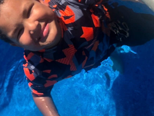Jared joined the competition — help win amazing prizes! azure, baby, child, electric_blue, fun, happy, joy, leisure, person, personal_protective_equipment, play, recreation, sitting, sky, smile, swimming_pool, toddler, tree, underwater, vacation