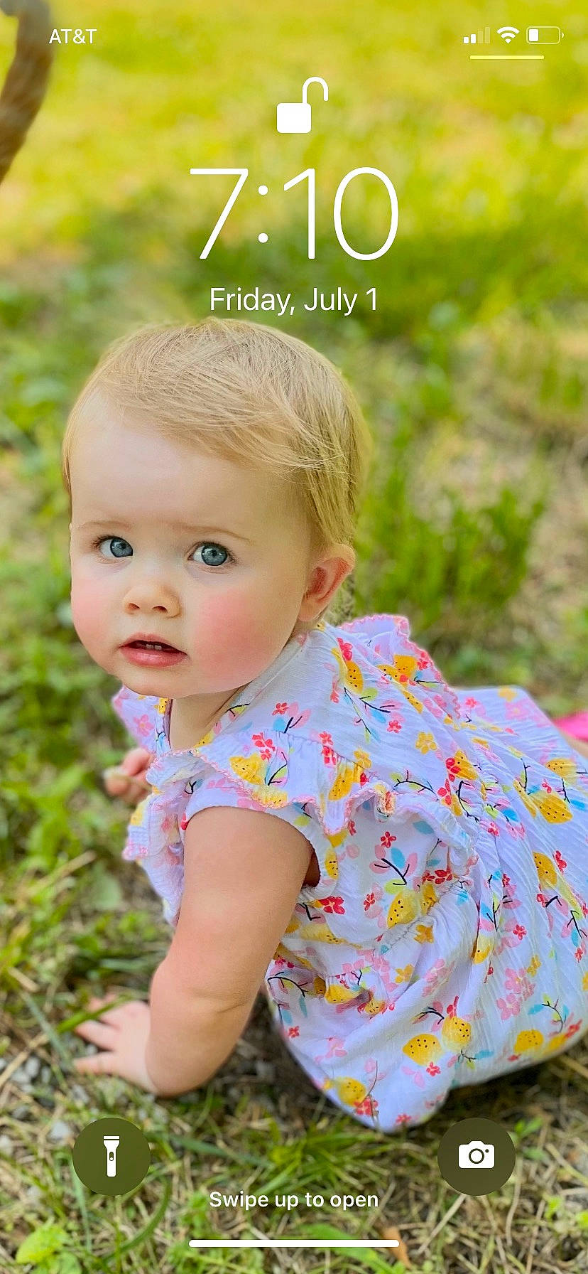 Emberleigh is registered to the contest to win money with this photo: baby_toddler_clothing, blond, cheek, child, face, grass, happy, iris, leisure, lip, pattern, people_in_nature, person, plant, skin, sleeve, smile, summer, toddler, tree