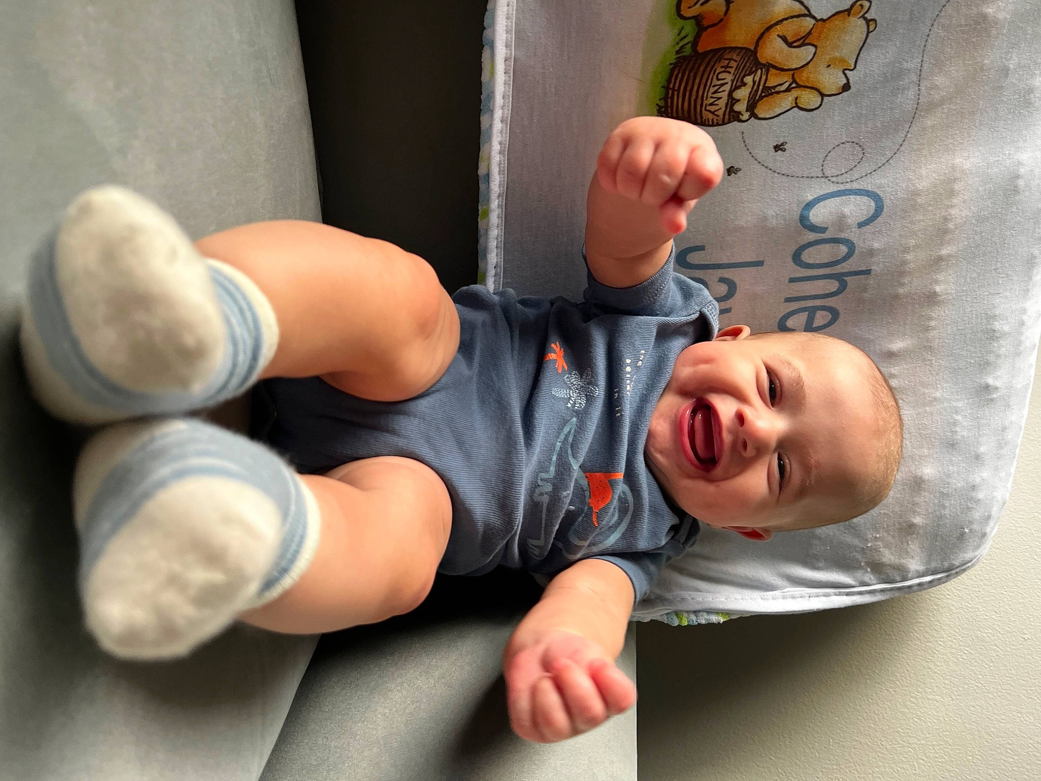 Cohen joined the competition — help win amazing prizes! baby, baby_toddler_clothing, barefoot, child, comfort, elbow, finger, foot, gesture, happy, human_body, human_leg, joint, knee, leg, person, smile, sportswear, thigh, thumb