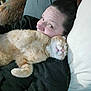 Chevy is registered to the contest to win money with this photo: person, woman, cat, ginger_cat, pet, cuddling, couch, pillow, blanket, indoor, cozy, sleeping_cat, fur, whiskers, smile, portrait, relaxation, home, pet_owner, nap
