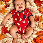 Freddy joined the competition — help win amazing prizes! autumn, baby, blanket, child, cozy, fall, family_photo, happy, indoor, infant, knitted_blanket, lying_down, maple_leaves, photography, portrait, pumpkins, red_clothing, seasonal, smiling, star_pattern