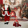 Mya joined the competition — help win amazing prizes! baby, christmas, holiday, present, gift, santa_claus, red_clothing, festive, decorations, christmas_tree, fireplace, candle, wreath, indoor, seasonal, cute, child, celebration, holiday_decor, smiling