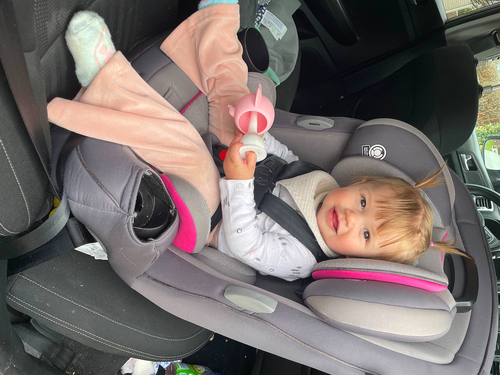 Skylynn is registered to the contest to win money with this photo: auto_part, automotive_design, automotive_exterior, baby_carriage, baby_in_car_seat, car, car_seat, car_seat_cover, comfort, gear_shift, mode_of_transport, motor_vehicle, person, personal_luxury_car, product, seat_belt, steering_part, steering_wheel, toddler, vehicle
