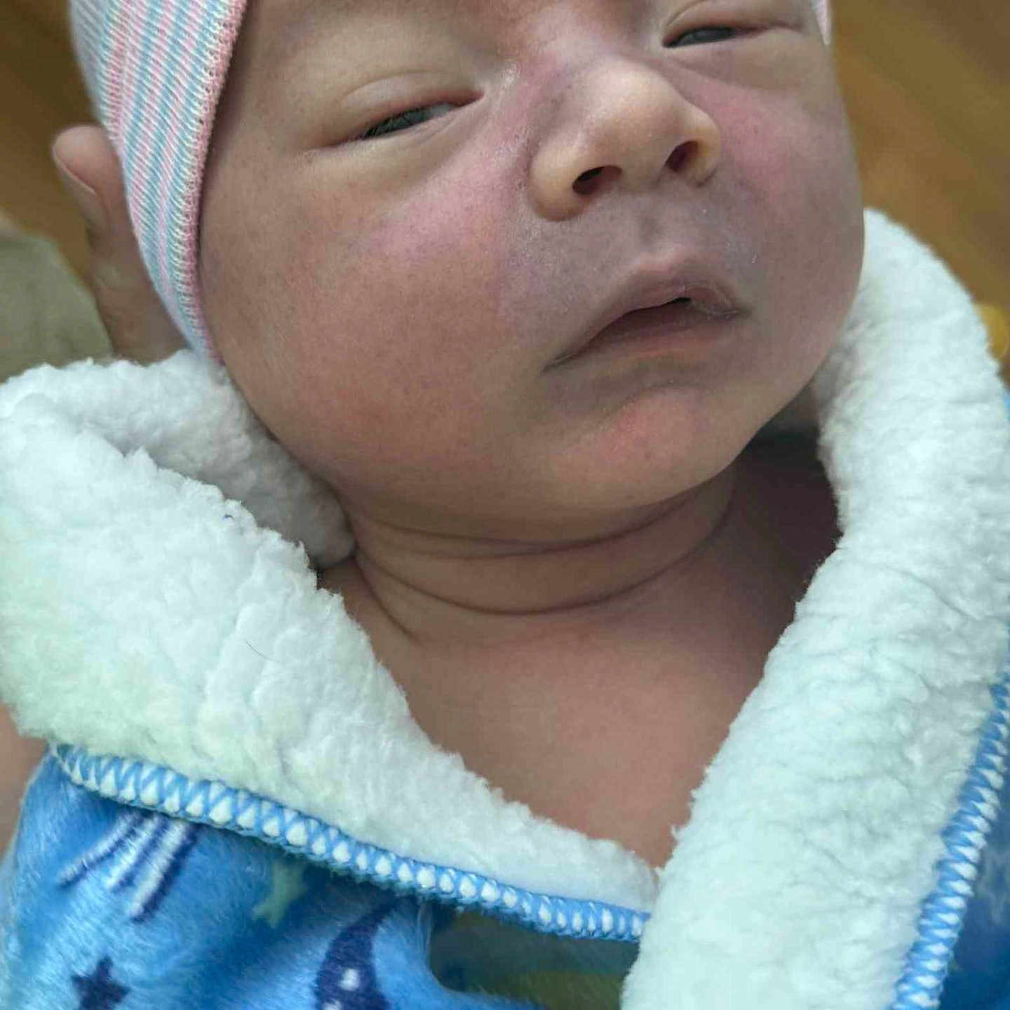 Coljay joined the competition — help win amazing prizes! baby, blanket, blue, close_up, clothing, cozy, expression, face, hat, headwear, infant, moon, newborn, person, portrait, skin, sleepy, soft, stars, warm