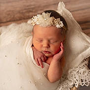 Eliana joined the competition — help win amazing prizes! newborn, baby, sleeping, headband, flower, white, fabric, blanket, soft, peaceful, portrait, infant, wrapped, cute, indoors, closeup, delicate, resting, toddler, peace