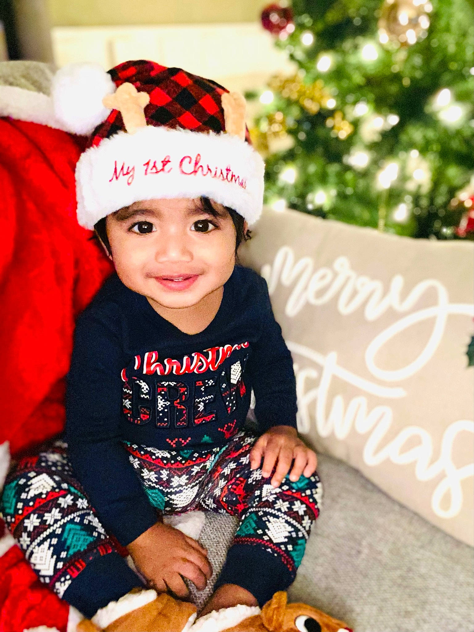 Ari joined the competition — help win amazing prizes! baby, baby_toddler_clothing, beanie, cap, child, christmas, christmas_eve, costume_hat, event, fashion_accessory, fun, green, happy, hat, headwear, holiday, joy, person, sleeve, smile