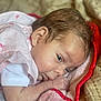Ashanda joined the competition — help win amazing prizes! baby, infant, blanket, soft, sleepy, closeup, face, skin, hair, newborn, cute, resting, lying_down, cozy, comfort, child, small, pink, white, fabric