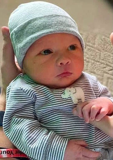 Ajay is registered to the contest to win money with this photo: baby, baby_products, baby_toddler_clothing, cap, cheek, child, chin, comfort, eye, finger, gesture, hand, headwear, lip, mouth, nose, person, product, skin, sleeve