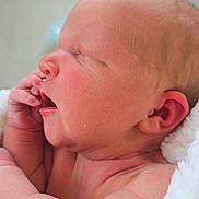 Aurora is registered to the contest to win money with this photo: newborn, baby, infant, sleeping, portrait, face, hand, curled_up, blanket, white_blanket, skin, ear, closed_eyes, peaceful, cozy, indoors, hospital, close_up, photography, child