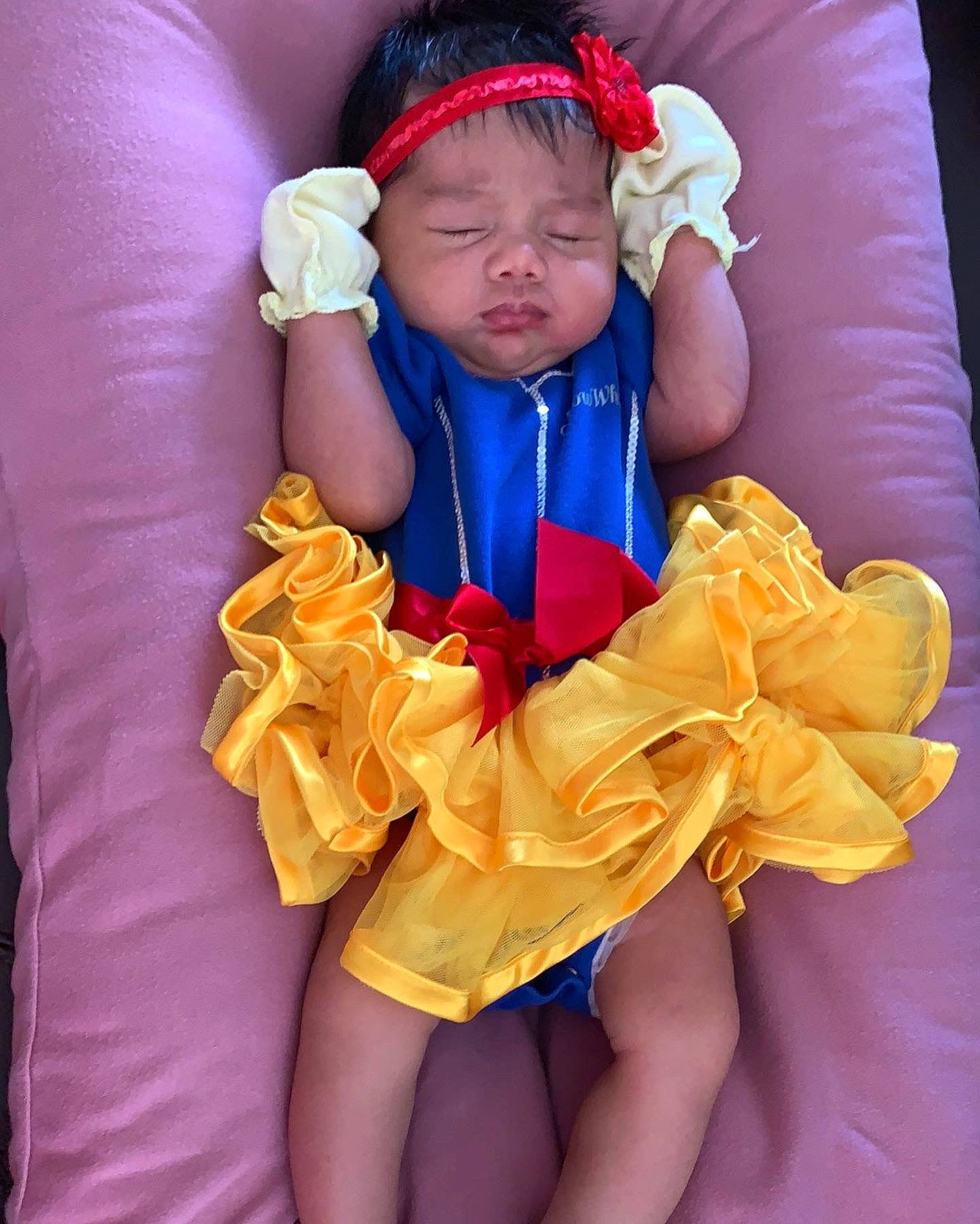 Haley joined the competition — help win amazing prizes! baby, baby_toddler_clothing, comfort, electric_blue, eye, finger, happy, headgear, headwear, human_body, nail, orange, person, pink, purple, red, skin, sleeve, textile, thigh