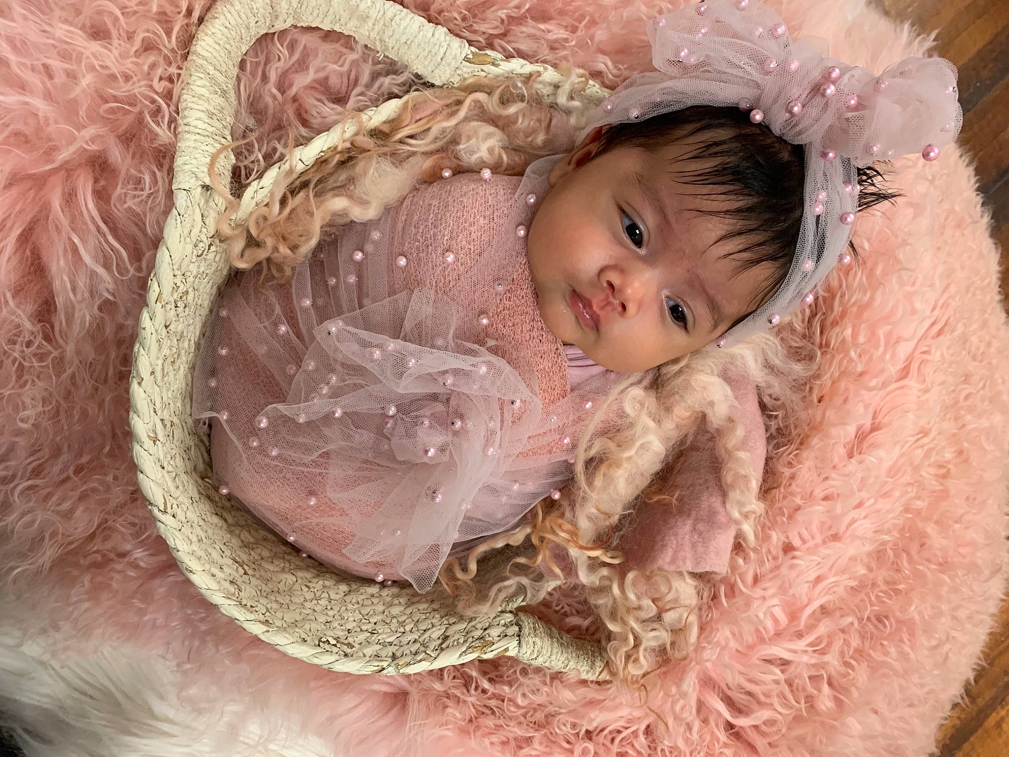 Haley is registered to the contest to win money with this photo: baby, bridal_accessory, cheek, doll, dress, embellishment, eyebrow, eyelash, fashion_accessory, fawn, fur, fur_clothing, hair_accessory, headgear, headpiece, iris, peach, person, pink, skin