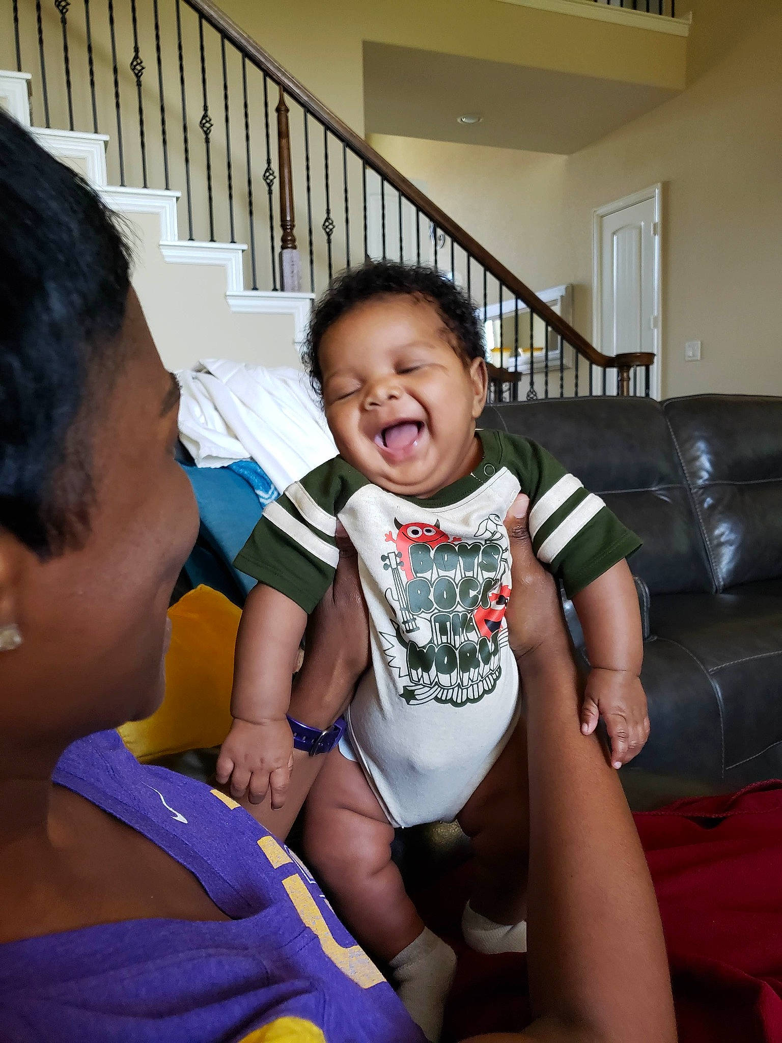 Chance is registered to the contest to win money with this photo: child, face, facial_expression, finger, fun, happy, leg, leisure, mouth, neck, people, person, play, room, sitting, skin, smile, thigh, toddler, vacation