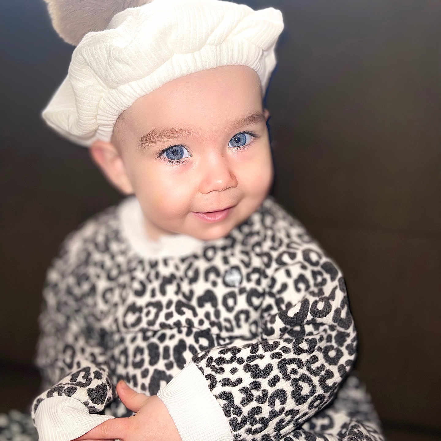 Illyonnah joined the competition — help win amazing prizes! baby, blonde, bodypart, bonnet, cap, clothing, dress, face, finger, hand, happy, hat, head, newborn, pants, person, photography, portrait, sitting, smile