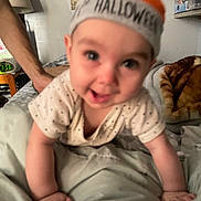 Illyonnah is registered to the contest to win money with this photo: baby, bed, bedroom, bonnet, cap, clothing, crawling, cushion, face, furniture, happy, hat, head, homedecor, indoors, person, photography, portrait, room, smile
