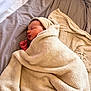 baby, bed, blanket, comfort, cozy, cushion, fabric, face, headwear, indoors, infant, newborn, peaceful, person, portrait, rest, sleeping, soft, warm, wrapped