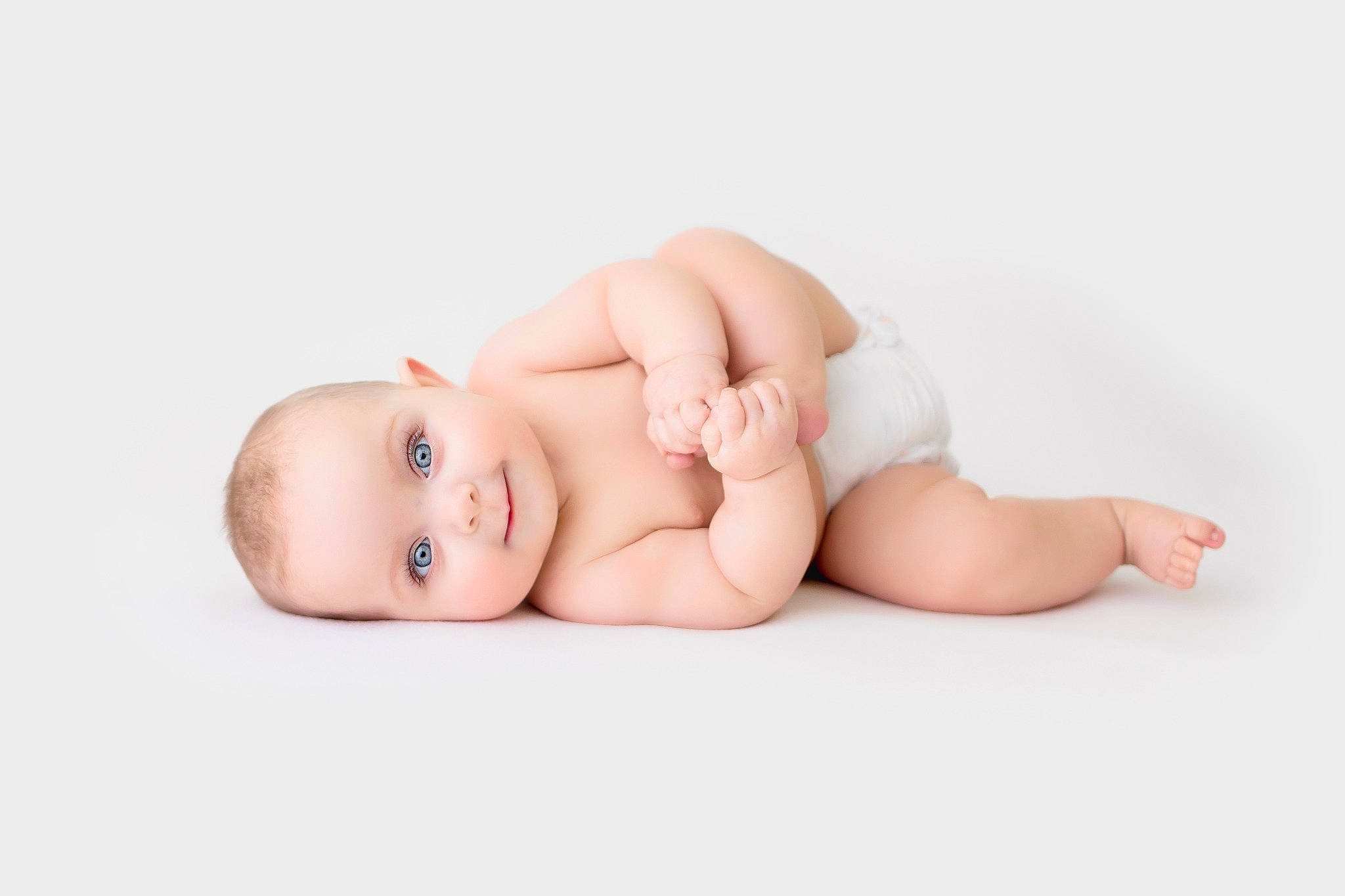 Willow is registered to the contest to win money with this photo: baby, baby_sleeping, baby_toddler_clothing, barefoot, cheek, child, comfort, eye, face, flash_photography, flesh, foot, happy, head, human_leg, joy, linens, person, portrait_photography, skin