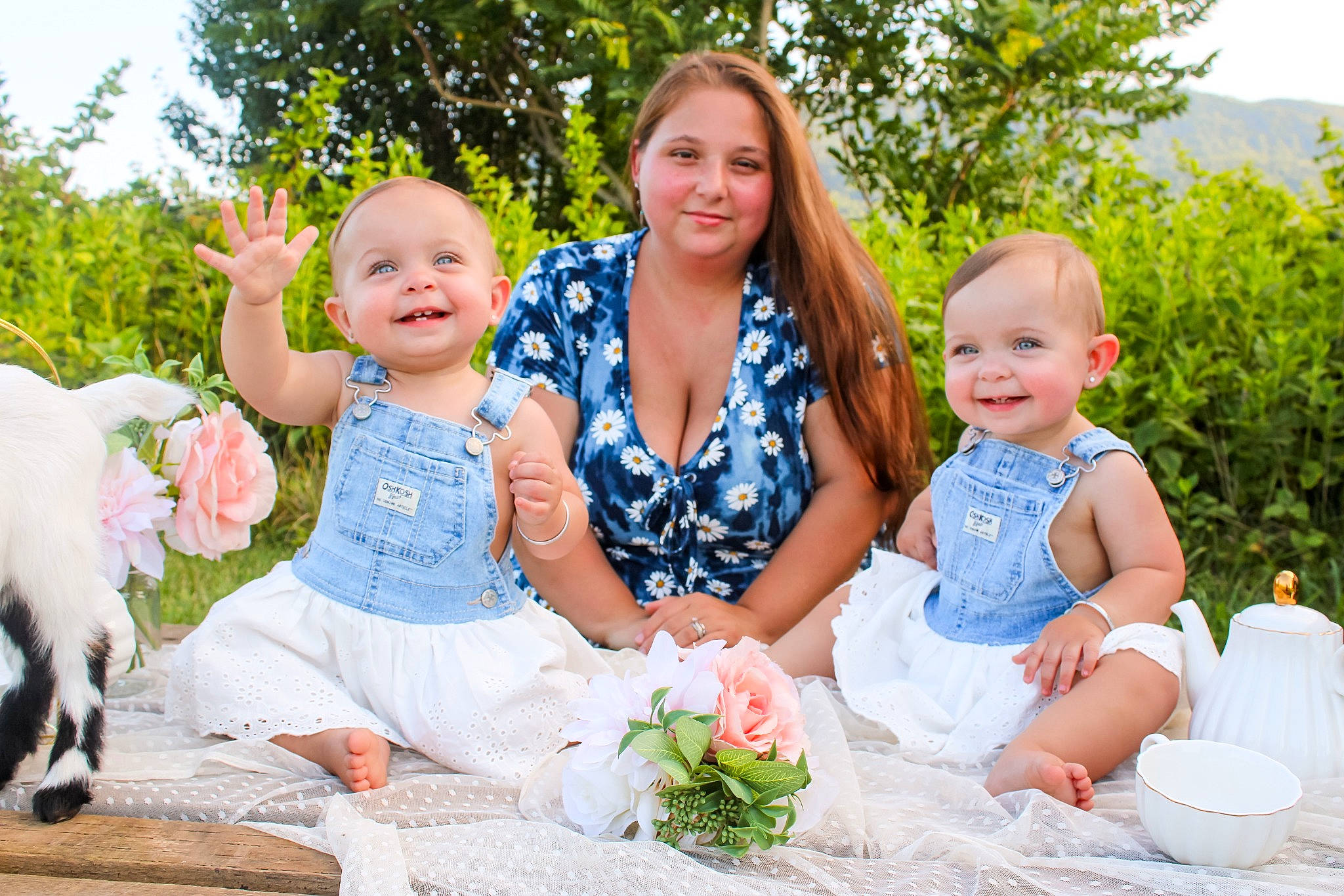 Willow joined the competition — help win amazing prizes! baby, baby_toddler_clothing, botany, dress, face, fun, grass, green, happy, head, interaction, iris, joy, people_in_nature, person, photograph, pink, plant, smile, toddler