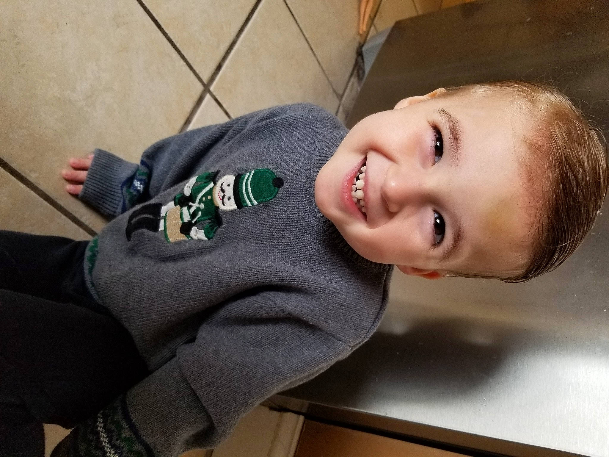 Luca joined the competition — help win amazing prizes! cheek, child, comfort, elbow, facial_expression, flooring, fun, hairstyle, happy, headgear, joy, knee, mouth, neck, nose, person, sitting, skin, sleeve, smile