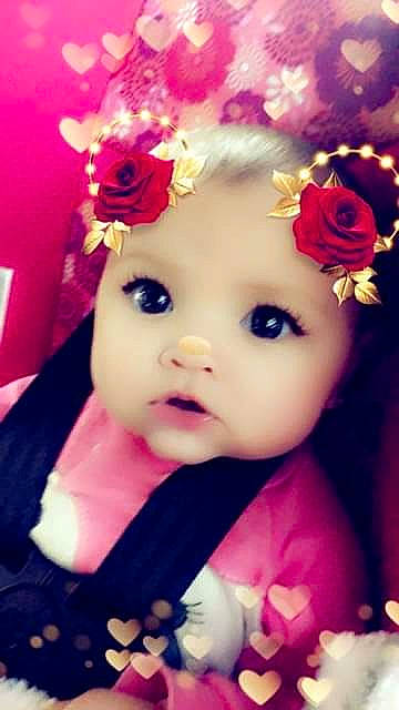 Jessie joined the competition — help win amazing prizes! baby, beauty, cheek, child, doll, eye, face, flower, hair_accessory, head, headgear, headpiece, lip, mouth, nose, person, petal, pink, plant, skin