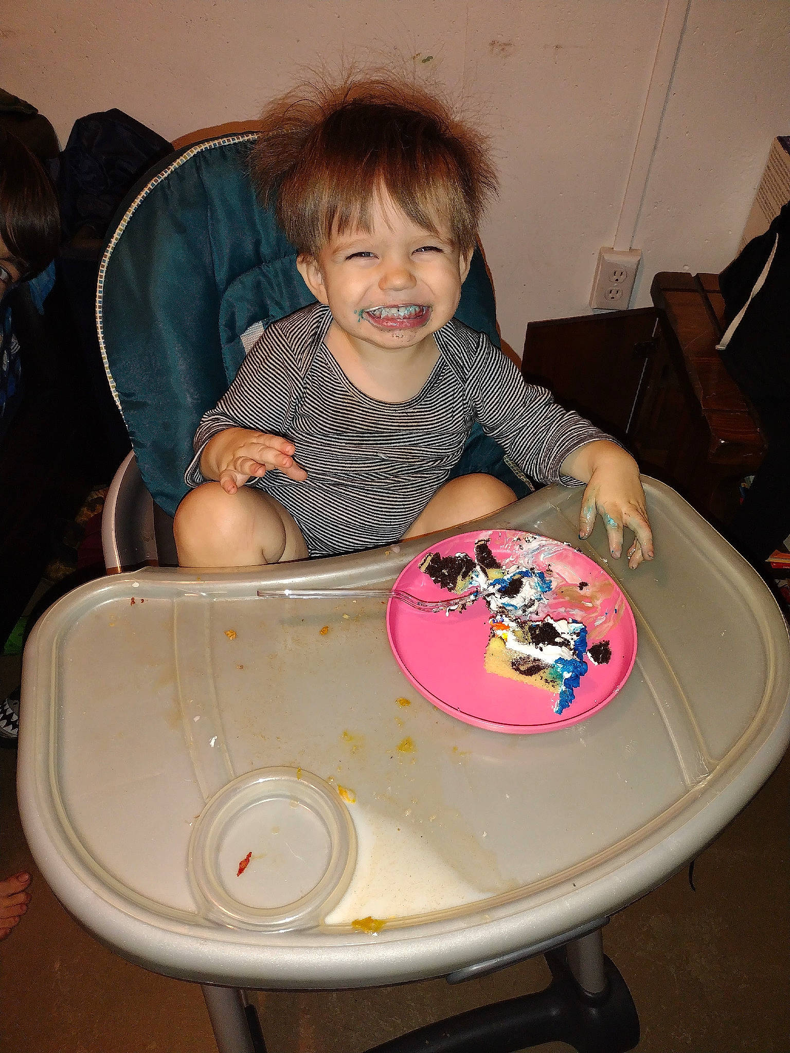 Kepha is registered to the contest to win money with this photo: baby, baby_toddler_clothing, chair, child, circle, comfort, dishware, eye, fun, happy, joy, person, plate, play, room, serveware, sharing, sitting, smile, table