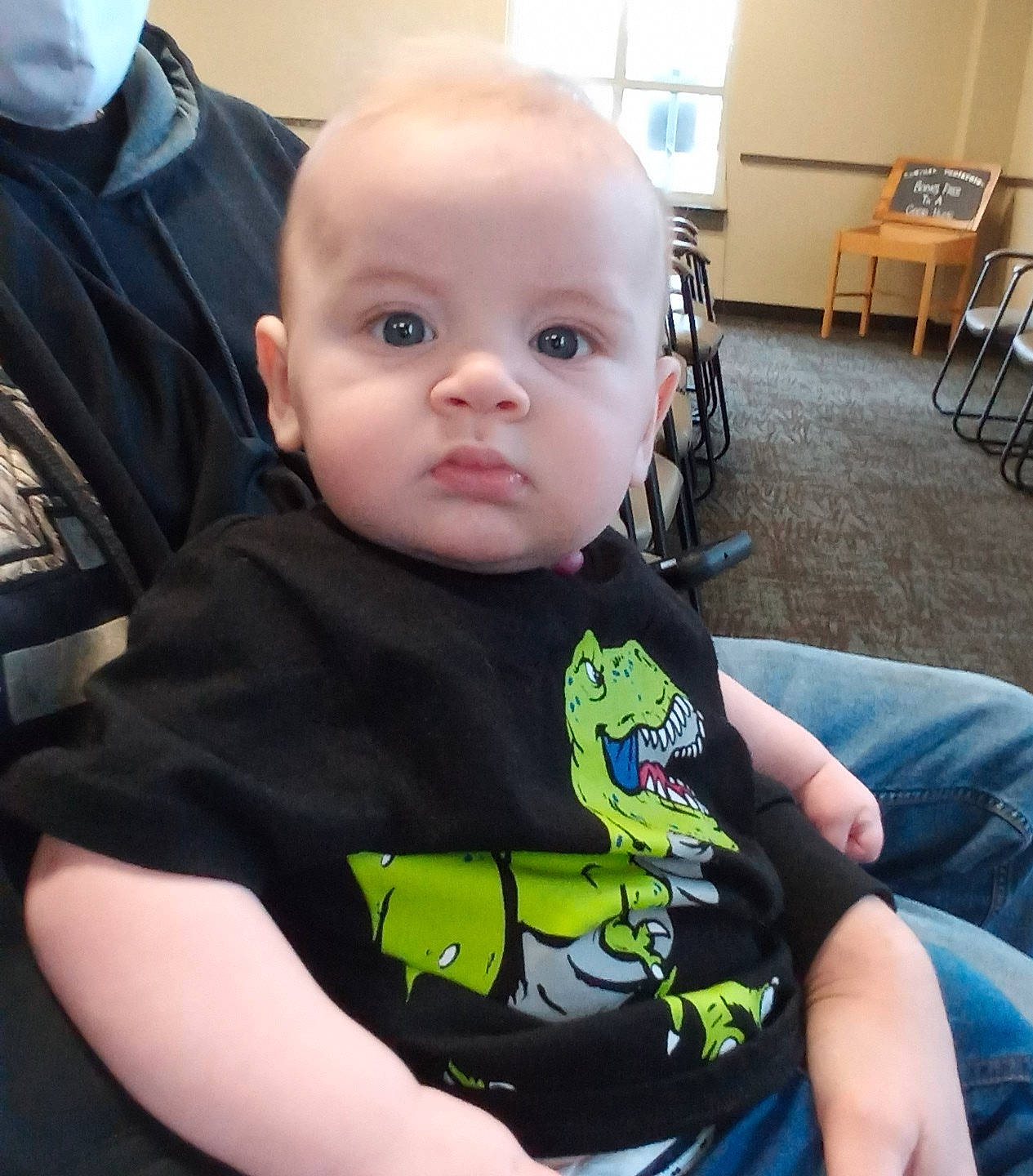 Ryan is registered to the contest to win money with this photo: baby, baby_toddler_clothing, chair, cheek, child, comfort, cool, elbow, fun, happy, iris, lap, mammal, person, sitting, skin, sleeve, t_shirt, thigh, toddler