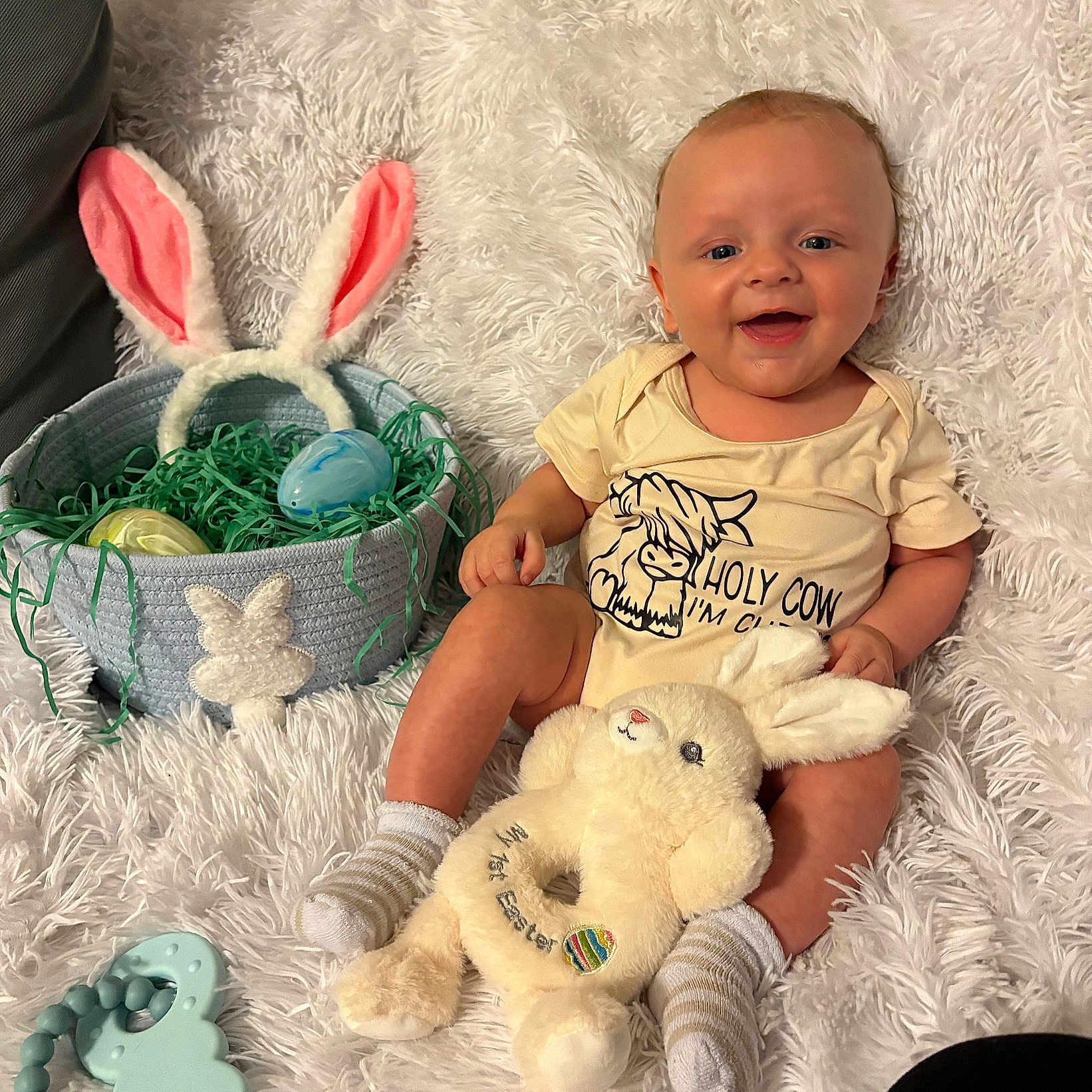 Carson joined the competition — help win amazing prizes! baby, blanket, bunny_ears, celebration, child, cute, easter_basket, easter_eggs, festive, happy, holiday, indoors, infant, onesie, plush_toy, portrait, smiling, socks, soft_toy, teething_toy